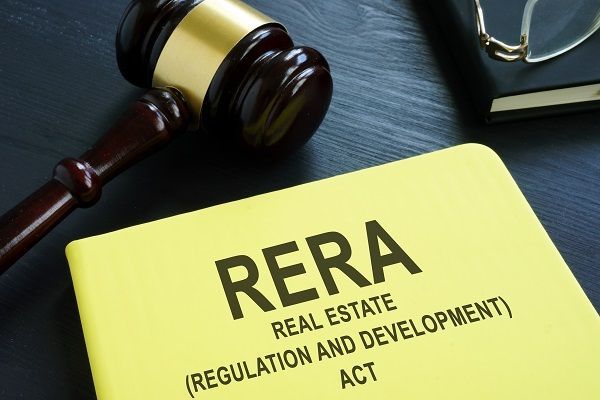 RERA Real Estate Regulation and Development Act document with judge's gavel, symbolizing housing sector regulation and legal compliance in India.